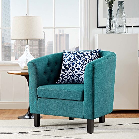 Upholstered fabric armchair in teal
