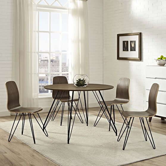 Circular dining table in walnut