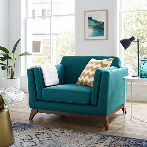 Upholstered fabric chair in teal