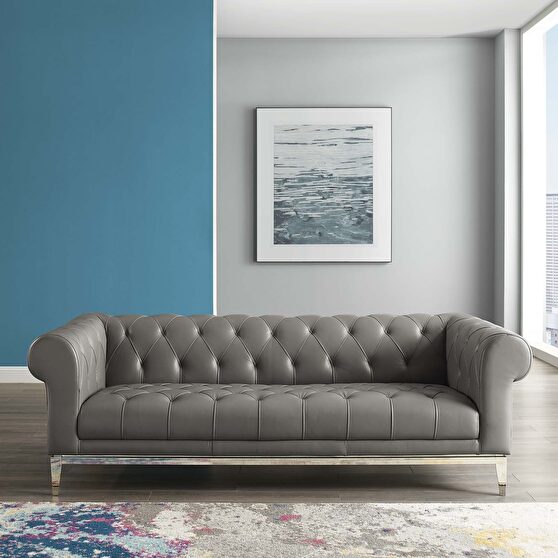 Tufted button upholstered leather chesterfield sofa in gray
