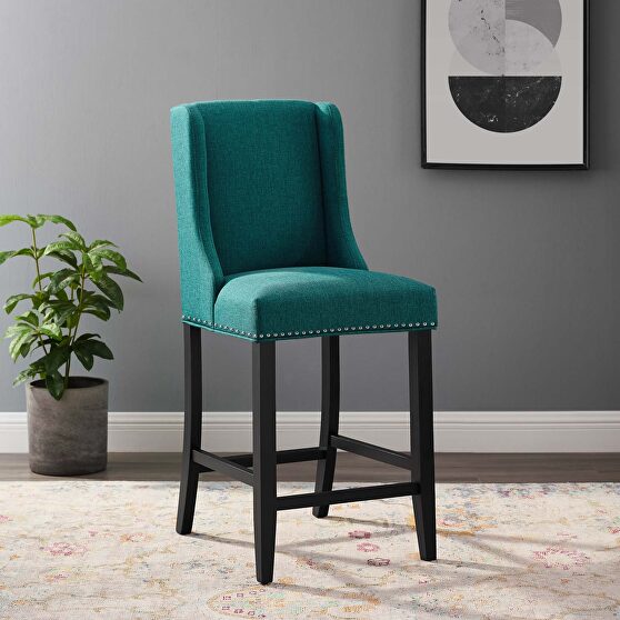 Upholstered fabric counter stool in teal