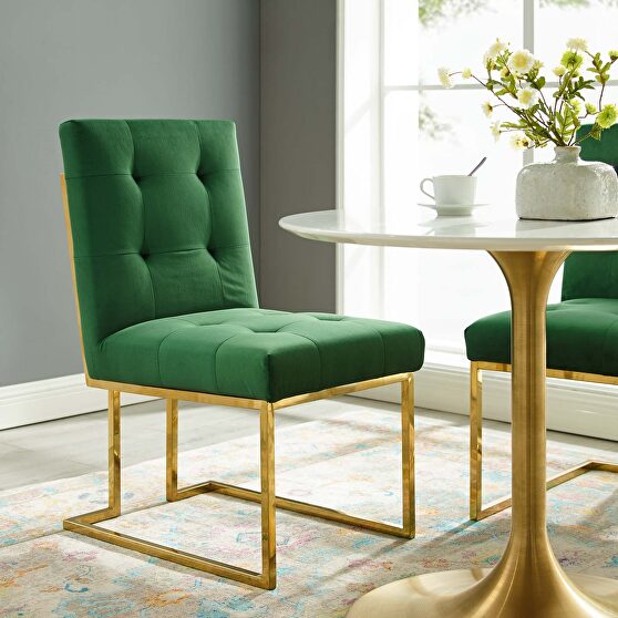 Gold stainless steel performance velvet dining chair in gold emerald
