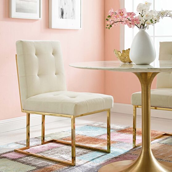 Gold stainless steel performance velvet dining chair in gold ivory