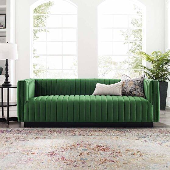 Channel tufted velvet sofa in emerald