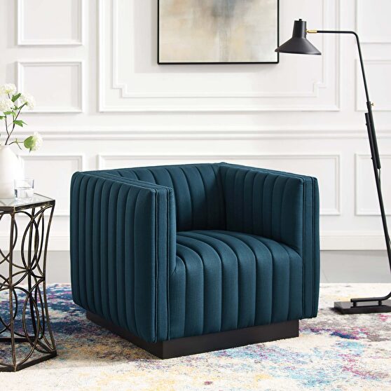 Tufted upholstered fabric armchair in azure