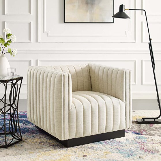 Tufted upholstered fabric armchair in beige