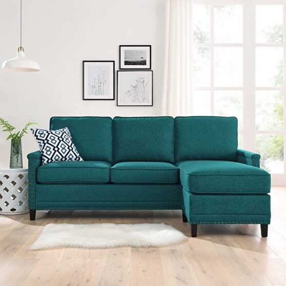 Upholstered fabric sectional sofa in teal