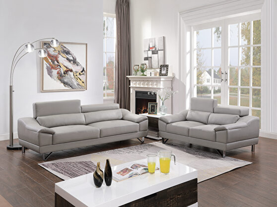 Gray faux leather sofa and loveseat set