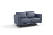 Serene blue leather overstuffed backrests and plush seats loveseat