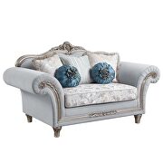 Light gray linen upholstery & platinum finish base floral trim accent loveseat