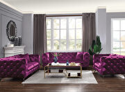 Purple fabric sofa in glam style