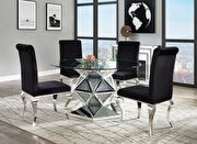 Geometric chrome base / round glass top dining table