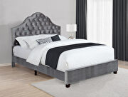 Queen slat bed upholstered in a gray velvet