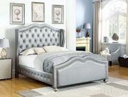 Grey upholstered tufted headboard queen bed