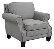 Gray woven fabric upholstery and antique brass finish nailhead chair