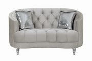Traditional gray fabric tufted curved back loveseat
