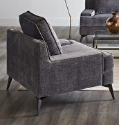 Upholstered in plush textured printed velvet chair