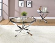 Round glass cocktail table x-shaped chrome legs