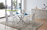 X-shaped chrome base / glass top dining table