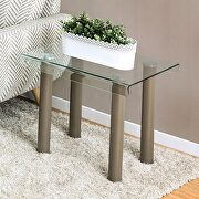 Accented with metal details glass top end table