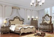 Traditionally styled queen bedroom w/ wood carvings main photo