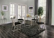 All metal round dining table with glass top
