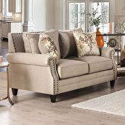 Beige/ gold chenille fabric loveseat with individual nailhead trim