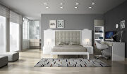 Contemporary white tiered headboard sleek king bed main photo
