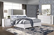 Contemporary white bed w/ light