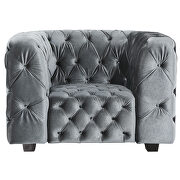Grey velvet chair with tufted seat and back main photo