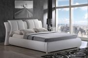 Casual style white bed w/ unique pillow headboard