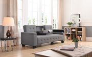 Gray faux leather sofa bed w/ tufted backs and seats main photo