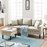 Beige fabric sectional sofa left hand facing with 2 pillows