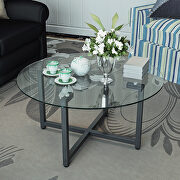 Round transparent tempered glass top and black legs coffee table main photo