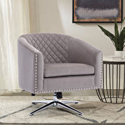 Gray velvet swivel barrel chair with nailheads and metal base