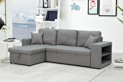 Gray sectional sofa with pulled out bed, 2 seats sofa and reversible chaise with storage main photo