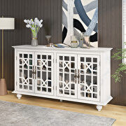 Sideboard with adjustable height shelves and 4 doors in antique white main photo