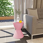 Pink smooth top over a ribbed design bottom side table main photo