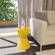 Yellow smooth top over a ribbed design bottom side table main photo