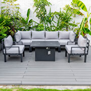 Light gray cushions 7-piece patio sectional and fire pit table black aluminum main photo