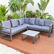Blue cushions and black base sectional with adjustable headrest & coffee table main photo