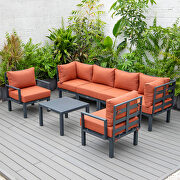 Orange finish cushions 7-piece patio sectional and coffee table set black aluminum main photo