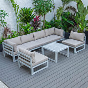 Beige finish cushions 7-piece patio sectional and coffee table set in weathered gray aluminum main photo
