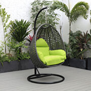 Light green cushion and charcoal wicker hanging egg swing chair main photo