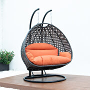 Orange wicker hanging double seater egg swing chair