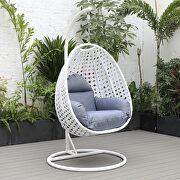 Single (Charcoal Blue) III Charcoal blue cushion and white wicker hanging egg swing chair