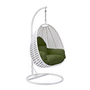 Dark green cushion and white wicker hanging egg swing chair