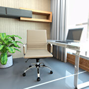 Tan leatherette and steel frame swivel office chair main photo