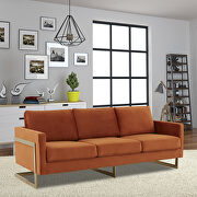 Modern mid-century upholstered orange marmalade velvet sofa with gold frame main photo