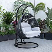 Light gray cushion and charcoal wicker hanging 2 person egg swing chair main photo